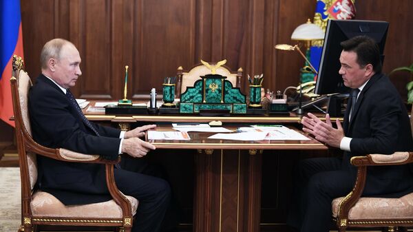 Президент РФ Владимир Путин и губернатор Московской области Андрей Воробьев  во время встречи в Кремле