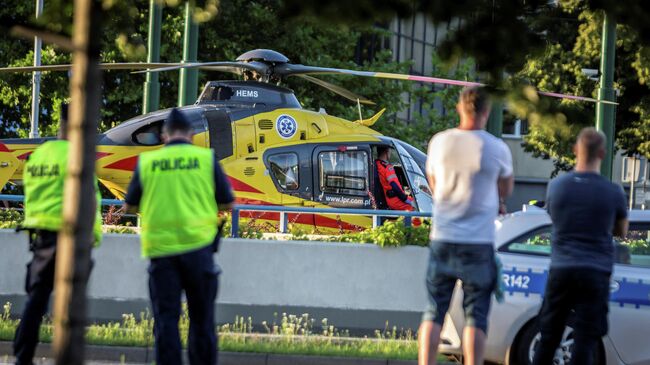 Вертолет скоро помощи возле места падения Фабио Якобсена