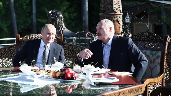 Президент РФ Владимир Путин и президент Белоруссии Александр Лукашенко во время встречи в Минске. 30 июня 2019