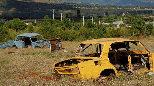 Кладбище автомобилей, в каждом из которых во время военных действий в августе 2008 года погибли жители города Цхинвали