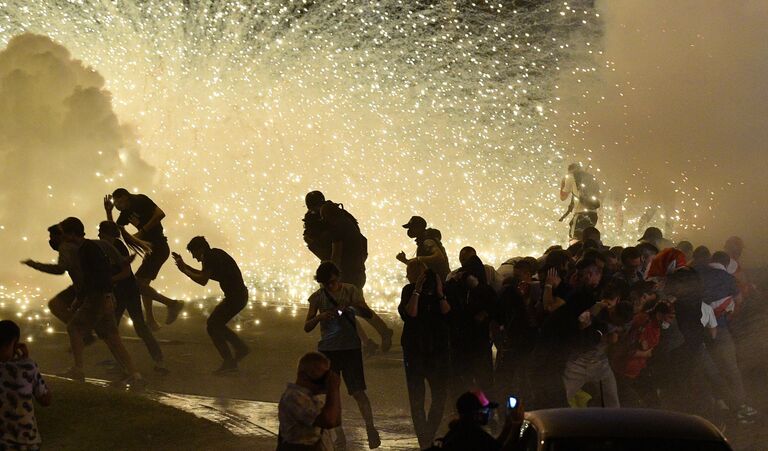 Участники акции протеста на одной из улиц в Минске Участники акции протеста на одной из улиц в Минске