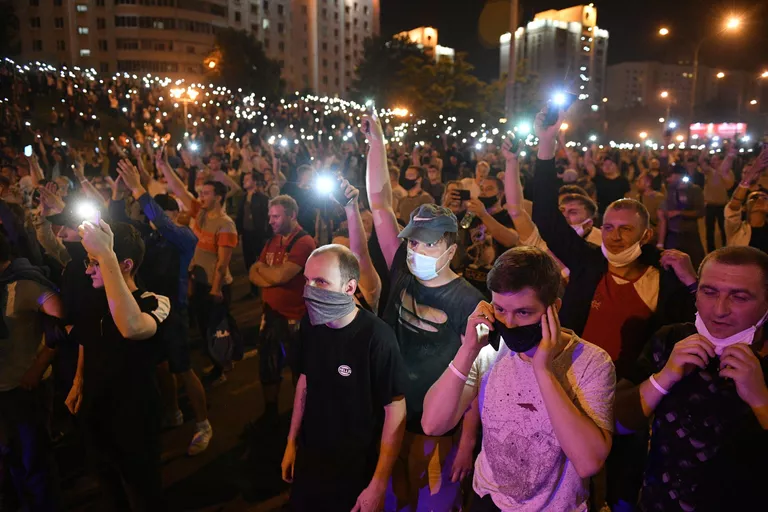 Участники акции протеста на одной из улиц в Минске Участники акции протеста на одной из улиц в Минске