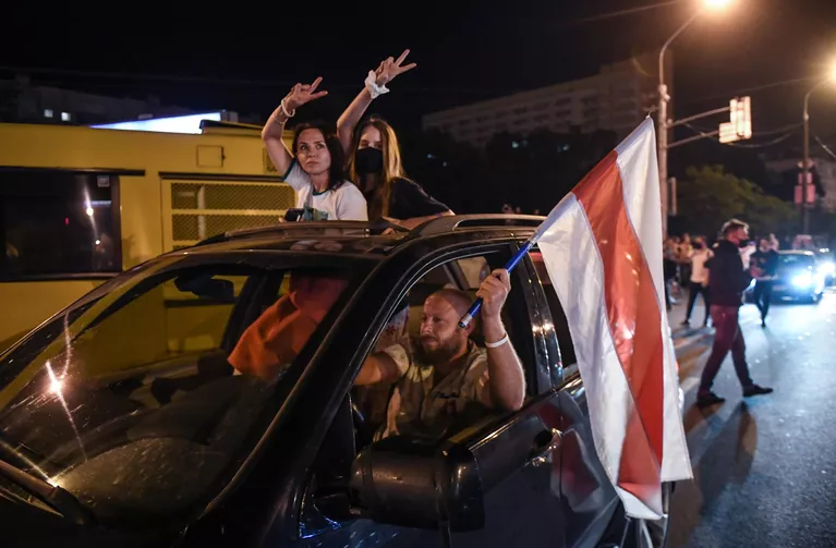 Участники акции протеста на одной из улиц в Минске Участники акции протеста на одной из улиц в Минске