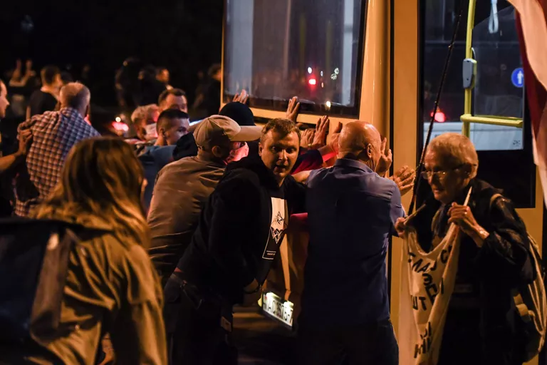 Участники акции протеста на одной из улиц в Минске Участники акции протеста на одной из улиц в Минске