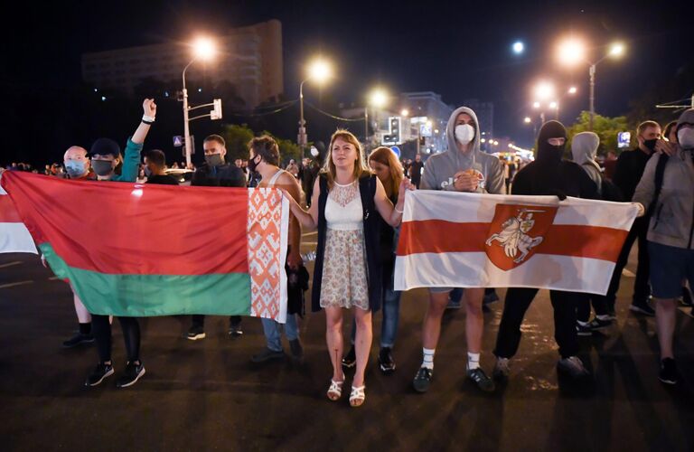 Участники акции протеста на одной из улиц в Минске Участники акции протеста на одной из улиц в Минске