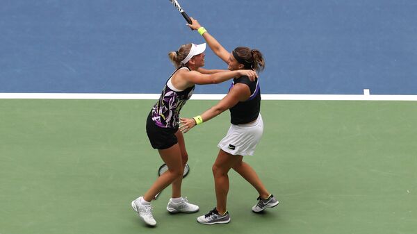 Действующие победительницы Открытого чемпионата США по теннису в парном разряде бельгийка Элизе Мертенс и Арина Соболенко