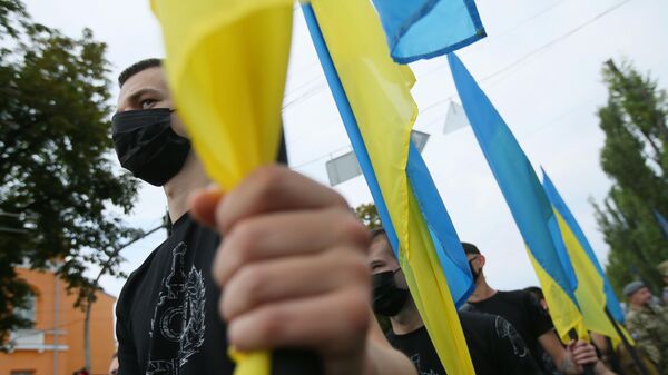 Участники Марша защитников Украины во время акции в рамках празднования Дня независимости страны в Киеве
