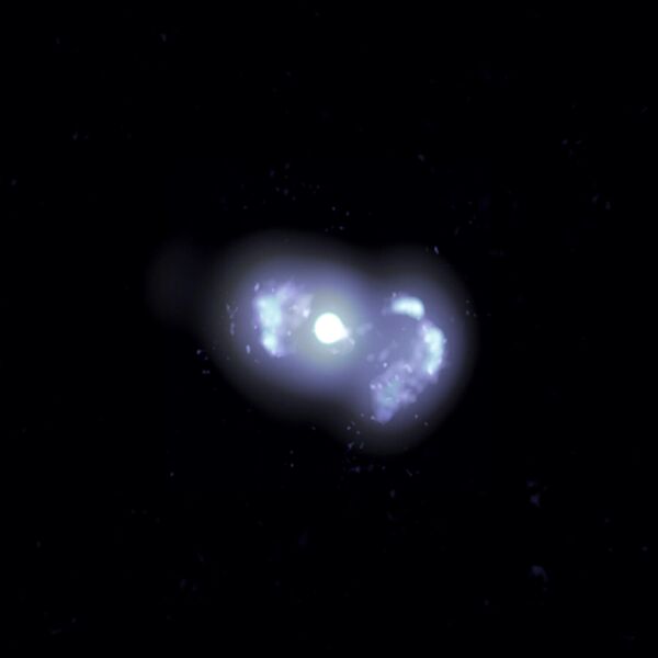 Многочастотное составное VLBA-изображение галактики TXS 0128+554, расположенной на расстоянии 500 миллионов световых лет от Земли
