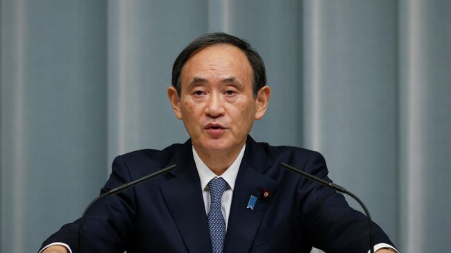 Генеральный секретарь Кабинета министров Японии Ёсихидэ Суга 