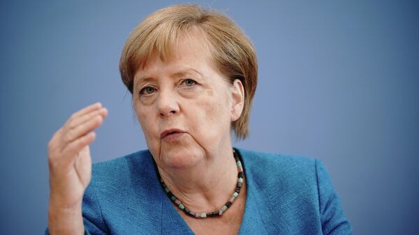 Ангела Меркель во время пресс-конференции в Берлине