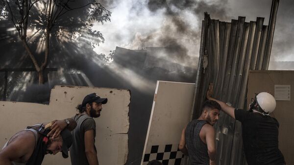 Участники столкновений между демонстрантами и силовиками в Бейруте