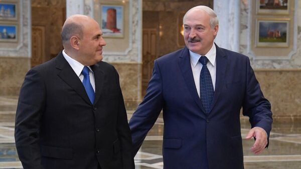 Председатель правительства РФ Михаил Мишустин и президент Белоруссии Александр Лукашенко во время встречи в Минске