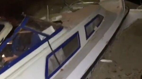 При столкновении баржи и катера в Сургуте погибли люди: кадры СК РФ