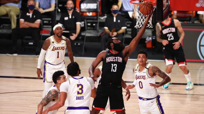 Sep 12, 2020; Lake Buena Vista, Florida, USA; Houston Rockets guard James Harden (13) attempts a shot around Los Angeles Lakers forward Anthony Davis (3) in game five of the second round of the 2020 NBA Playoffs at ESPN Wide World of Sports Complex. Mandatory Credit: Kim Klement-USA TODAY Sports