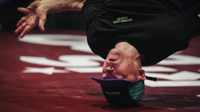 A dancer performs during the Breakdance contest Paris Battle Pro at La Seine Musicale in Paris on February 23, 2019. - Breakdancing is set to make its debut as an Olympic sport at Paris 2024, the head of the local organising committee said on February 21, 2019, Skateboarding, sport climbing and surfing, which have already been added to the programme for the 2020 Tokyo Olympics, have been invited to return in Paris four years later. (Photo by LUCAS BARIOULET / AFP)