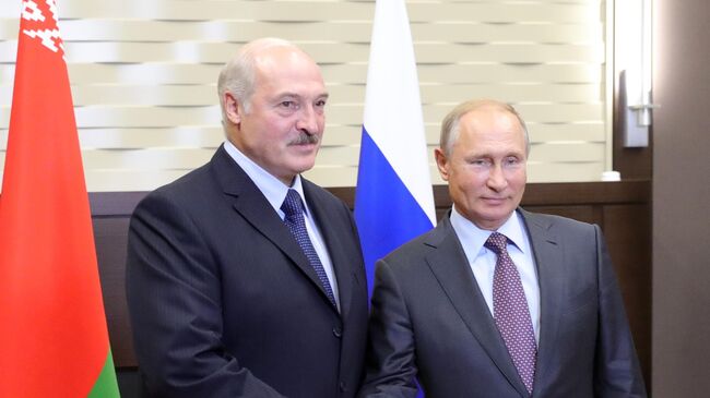 Президент России Владимир Путин и президент Белоруссии Александр Лукашенко во время встречи