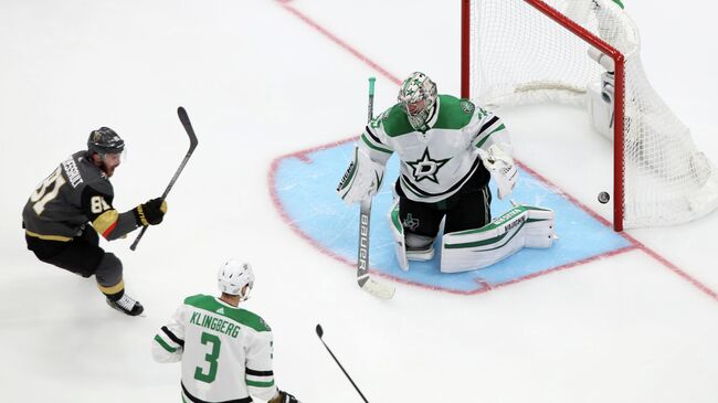 Sep 14, 2020; Edmonton, Alberta, CAN; Vegas Golden Knights center Jonathan Marchessault (81) scores a goal past Dallas Stars goaltender Anton Khudobin (35) during the third period in game five of the second round of the 2020 Stanley Cup Playoffs at Rogers Place. Mandatory Credit: Gerry Thomas-USA TODAY Sports