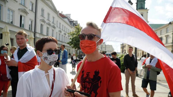 Акция в поддержку протестов в Белоруссии в Варшаве