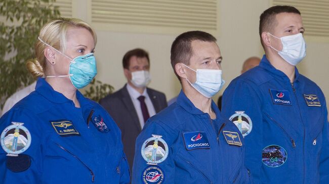 Члены основного экипажа 64-й экспедиции на Международную космическую станцию