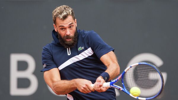 Benoit Paire of France returns the ball to Casper Ruud of Norway during their first round match of the ATP-Tour German Open tennis tournament at the stadium Am Rothenbaum in Hamburg, northern Germany, on September 23, 2020. - Paire gave up in the second set. (Photo by Daniel Bockwoldt / dpa / AFP) / Germany OUT