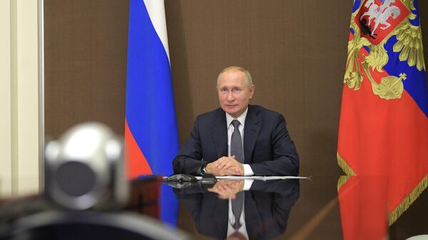 Президент РФ Владимир Путин во время встречи в режиме видеоконференции с президентом Молдавии Игорем Додоном