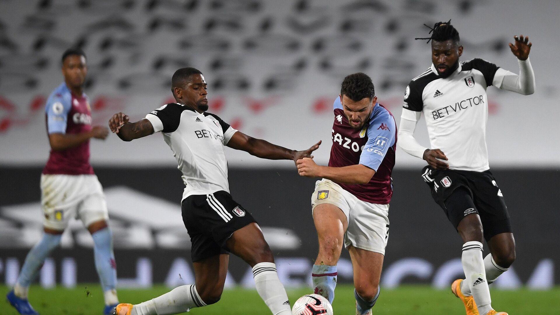 Fulham's Portuguese striker Ivan Cavaleiro (L fouls Aston Villa's Scottish midfielder John McGinn during the English Premier League football match between Fulham and Aston Villa at Craven Cottage in London on September 28, 2020. (Photo by Mike Hewitt / POOL / AFP) / RESTRICTED TO EDITORIAL USE. No use with unauthorized audio, video, data, fixture lists, club/league logos or 'live' services. Online in-match use limited to 120 images. An additional 40 images may be used in extra time. No video emulation. Social media in-match use limited to 120 images. An additional 40 images may be used in extra time. No use in betting publications, games or single club/league/player publications. /  - РИА Новости, 1920, 28.09.2020