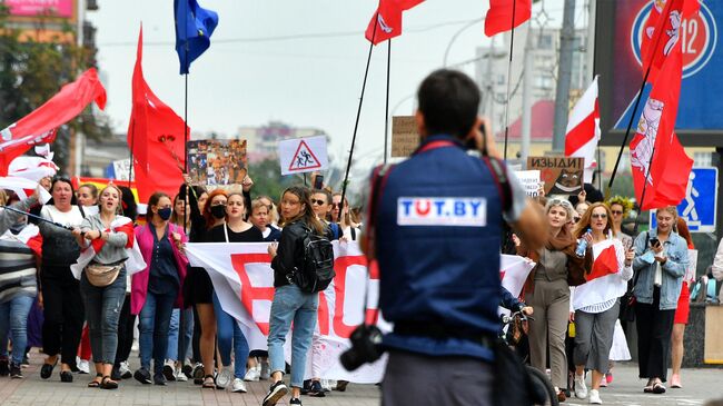 Фотокорреспондент Tut.by во время протестной акции в Минске