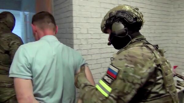 Кадр видео спецоперации против укравших из Валдайского монастыря подаренную Путиным икону