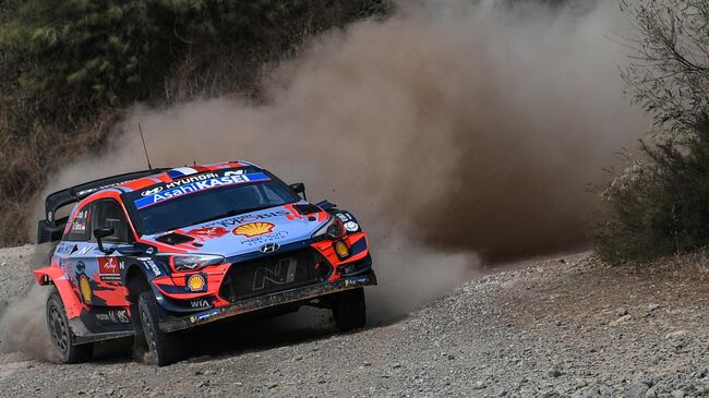 French driver Sebastien Loeb and co-driver Daniel Elena steer their Hyundai i20 coupe WRC racing car during the Marmaris stage on the third and last day of the Turkish WRC rally in Mugla on September 20, 2020. (Photo by Ozan KOSE / AFP)