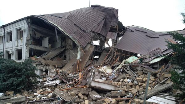 Дом, поврежденный в результате обстрелов Степанакерта