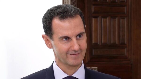 Президент Сирийской Арабской Республики Башар Асад  во время интервью информационному агентству РИА Новости