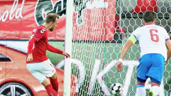 Denmark's midfielder Christian Eriksen scores the 2-0 during the friendly football match between Denmark and the Faroe Islands in Herning, Denmark, on October 7, 2020. (Photo by Henning Bagger / Ritzau Scanpix / AFP) / Denmark OUT