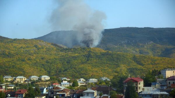Дым от пожаров вследствие артиллерийских ударов по Степанакерту