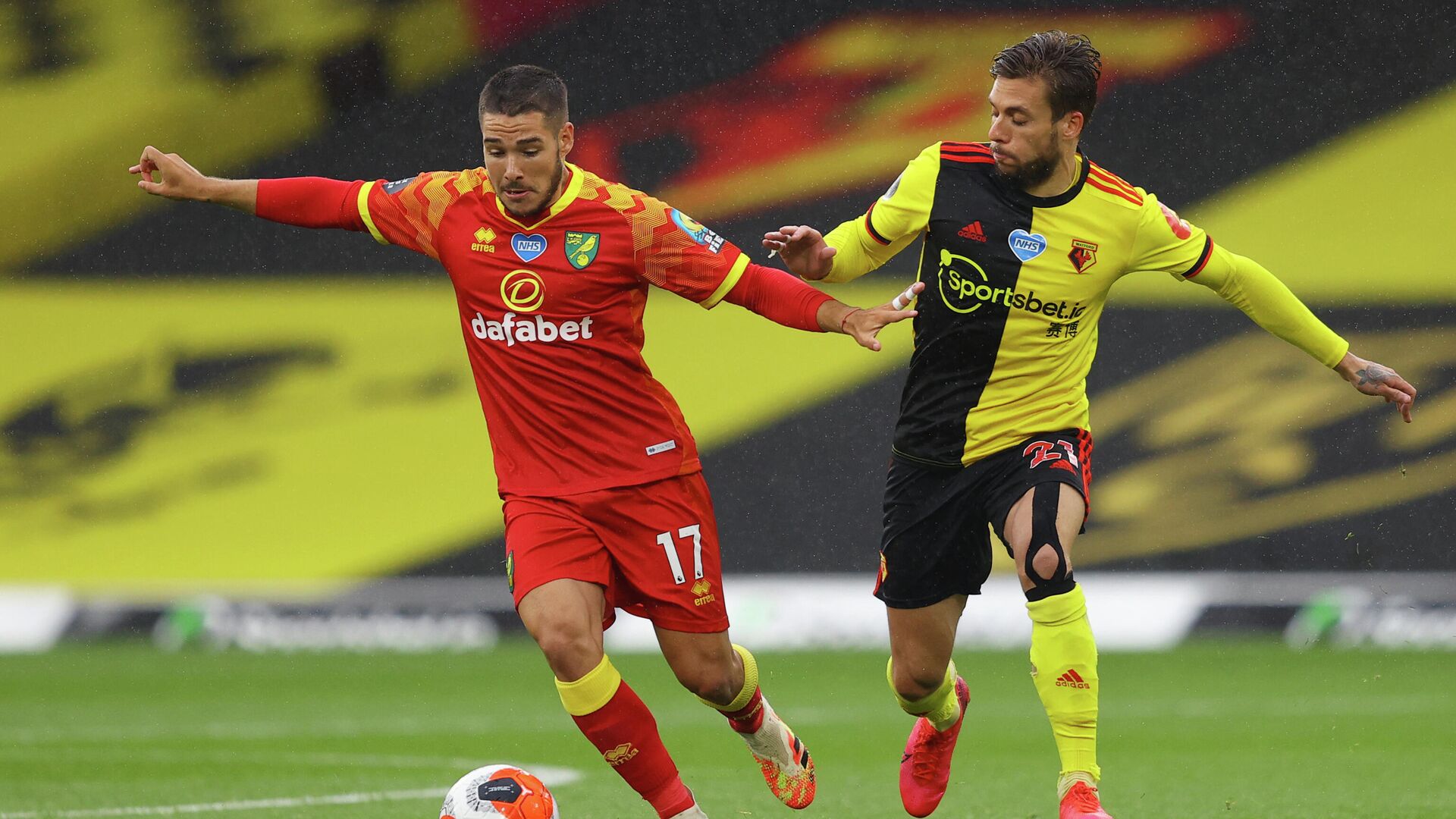 Norwich City's Argentinian midfielder Emiliano Buendia (L) vies for the ball with Watford's Spanish defender Kiko Femenia  during the English Premier League football match between Watford and Norwich City at Vicarage Road Stadium in Watford, north of London, on July 7, 2020. (Photo by Richard Heathcote / various sources / AFP) / RESTRICTED TO EDITORIAL USE. No use with unauthorized audio, video, data, fixture lists, club/league logos or 'live' services. Online in-match use limited to 120 images. An additional 40 images may be used in extra time. No video emulation. Social media in-match use limited to 120 images. An additional 40 images may be used in extra time. No use in betting publications, games or single club/league/player publications. /  - РИА Новости, 1920, 08.10.2020