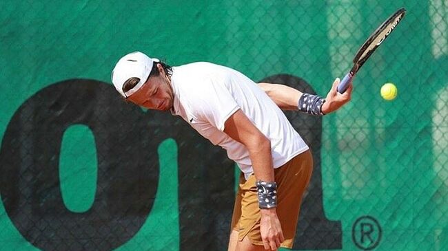 Российский теннисист Евгений Карловский.