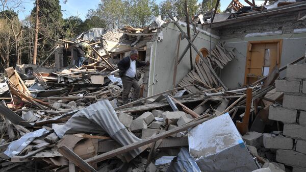  Жилые дома, разрушенные в результате ракетного обстрела города Гянджа