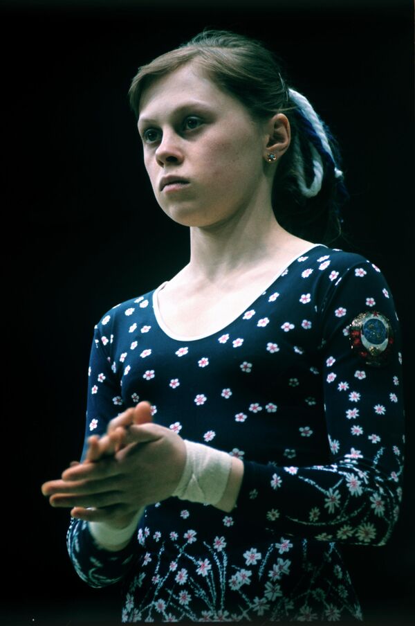 Абсолютная чемпионка мира по спортивной гимнастике Елена Мухина.