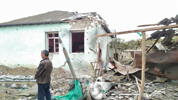Последствия обстрела в селе Рзалар Агдамского района в Азербайджане