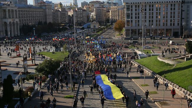 Участники марша националистов в Киеве в честь годовщины создания Украинской повстанческой армии