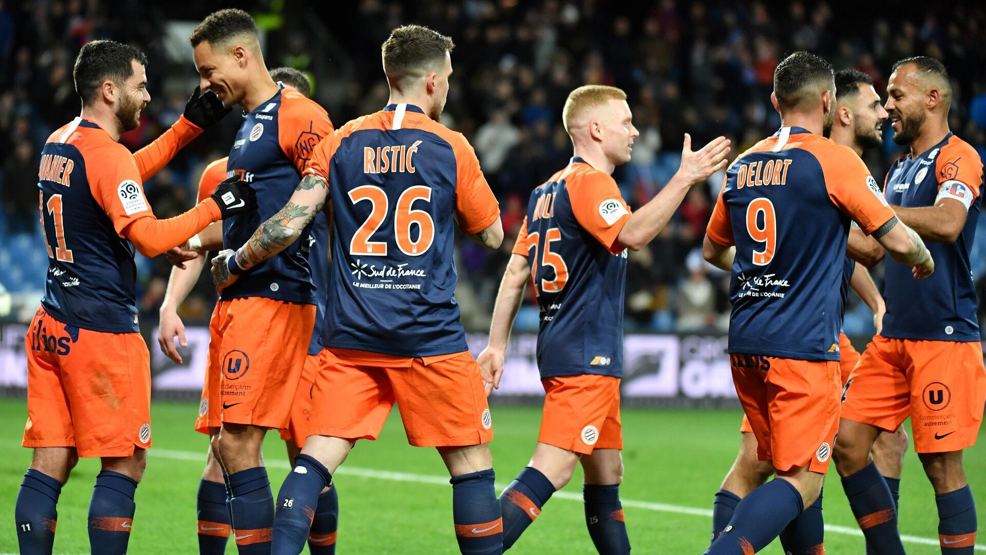 Montpellier's players react after scoring a goal during the French L1 football match between Montpellier and Strasbourg at the Mosson stadium in Montpellier, southern France, on February 29, 2020. (Photo by Pascal GUYOT / AFP) - РИА Новости, 1920, 16.10.2020