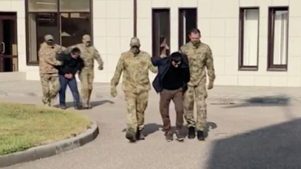 ФСБ задержала двух членов банды Шамиля Басаева. Стоп-кадр видео