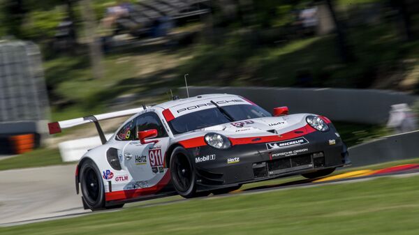 ELKHART LAKE, WI - AUGUST 04: The #911 Porsche 911 RSR of Nick Tandy, of Great Britain, oand Patrick Pilet, of France, races on the track during practice for the IMSA Continental Road Race Showcase at Road America on August 4, 2018 in Elkhart Lake, Wisconsin.   Brian Cleary/Getty Images/AFP