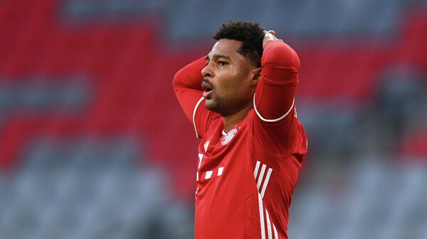 (FILES) In this file photo taken on October 4, 2020 Bayern Munich's German midfielder Serge Gnabry reacts during the German first division Bundesliga football match FC Bayern Munich vs Hertha Berlin in Munich, southern Germany. - Bayern Munich's German midfielder Serge Gnabry has tested positiv for Covid-19 the club reported on October 20, 2020. (Photo by CHRISTOF STACHE / AFP) / DFL REGULATIONS PROHIBIT ANY USE OF PHOTOGRAPHS AS IMAGE SEQUENCES AND/OR QUASI-VIDEO