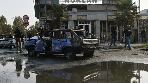 Последствия обстрела в азербайджанском городе Барда