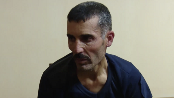 Допрос захваченного в Карабахе сирийца