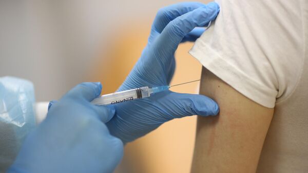 Вакцинация от коронавируса пациента в городской поликлинике