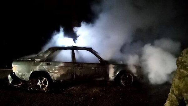 Кадры дымящегося автомобиля после обстрела в Степанакерте