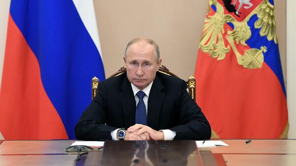 Президент РФ Владимир Путин проводит оперативное совещание с членами Совета безопасности РФ в режиме видеоконференции. Архивное фото