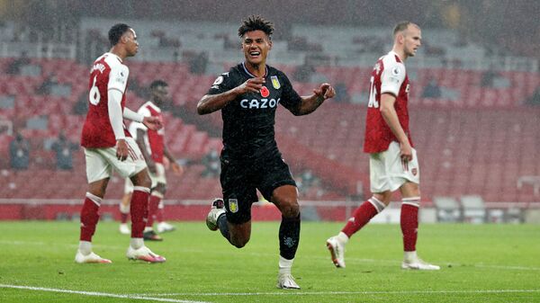 Aston Villa's English striker Ollie Watkins celebrates scoring his team's second goal during the English Premier League football match between Arsenal and Aston Villa at the Emirates Stadium in London on November 8, 2020. (Photo by Alastair Grant / POOL / AFP) / RESTRICTED TO EDITORIAL USE. No use with unauthorized audio, video, data, fixture lists, club/league logos or 'live' services. Online in-match use limited to 120 images. An additional 40 images may be used in extra time. No video emulation. Social media in-match use limited to 120 images. An additional 40 images may be used in extra time. No use in betting publications, games or single club/league/player publications. / 