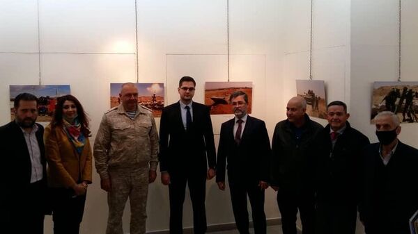 Фотовыставка РИА Новости о хронике войны в Сирии открылась в Дамаске